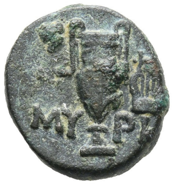 Eolia, Mirina. Cerca del siglo II-I a.C. Dicálcico o dicalco.