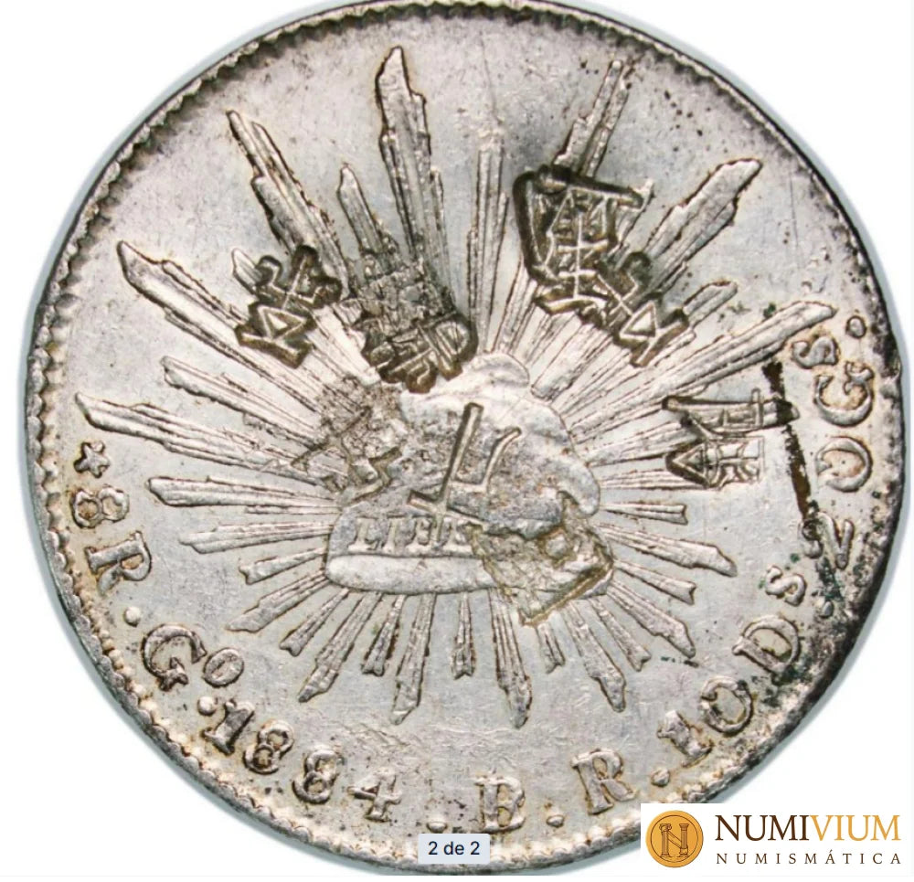 México: 8 Reales de plata de 1884. Ceca de Guanajuato. Resellada.